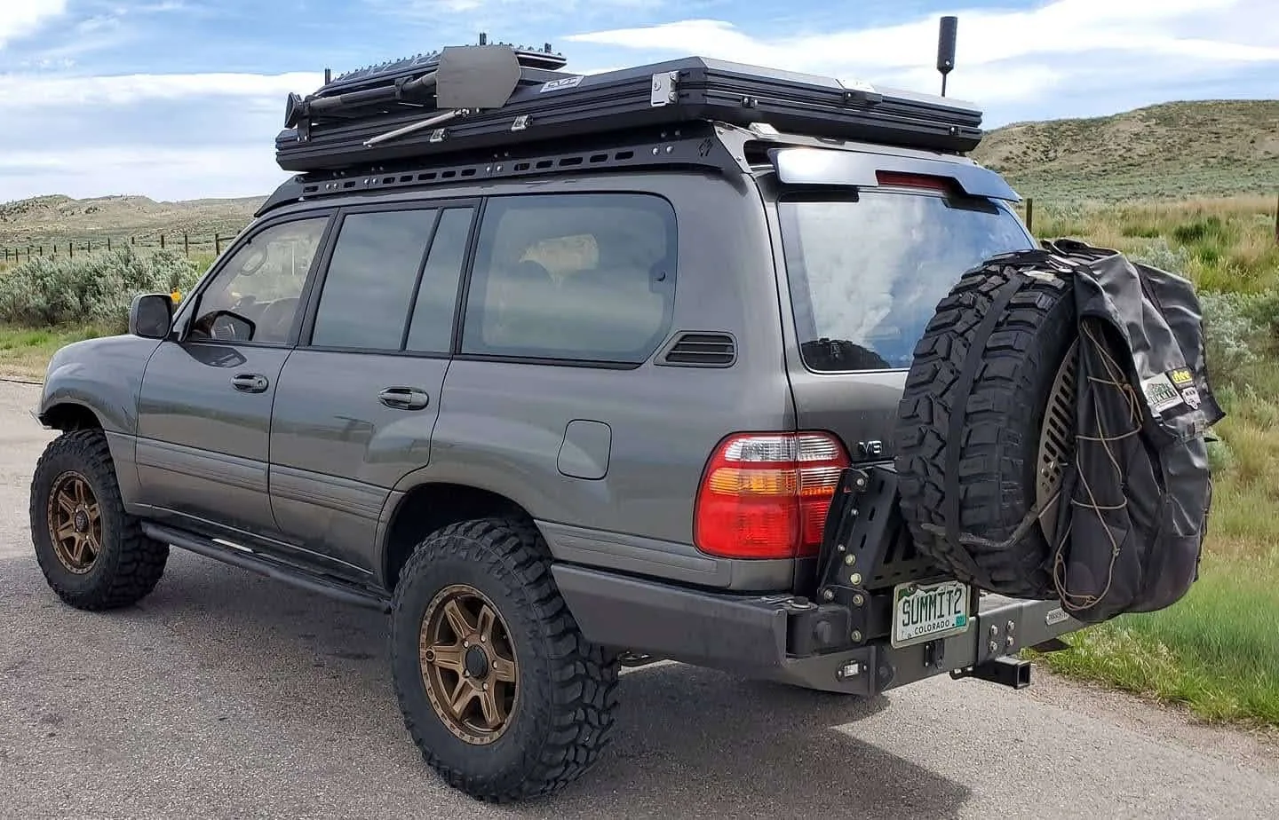 Built Toyota Land Cruiser 100 Series overland rig with SUMMIT2 Colorado plate